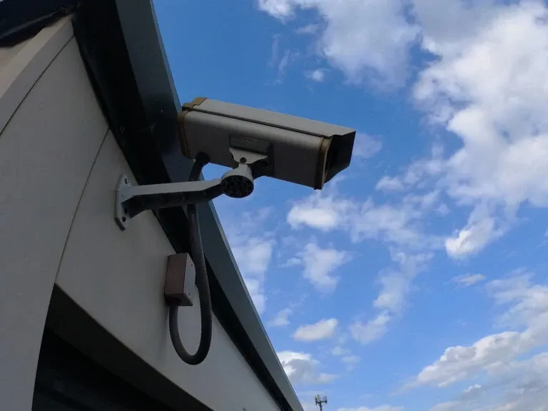 Outdoor secutiry camera overlooking drive up storage units. 